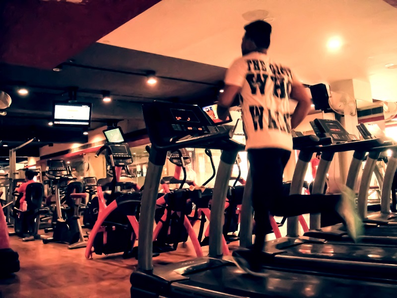 A guy running on treadmill