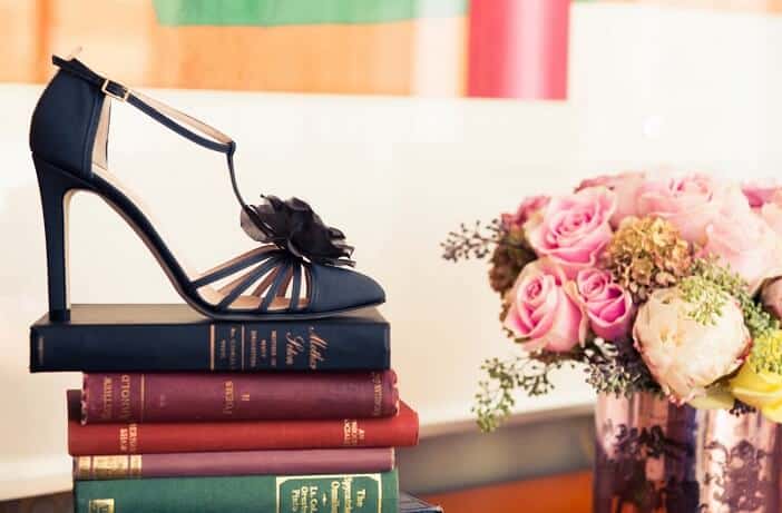 Black heels sandal on books